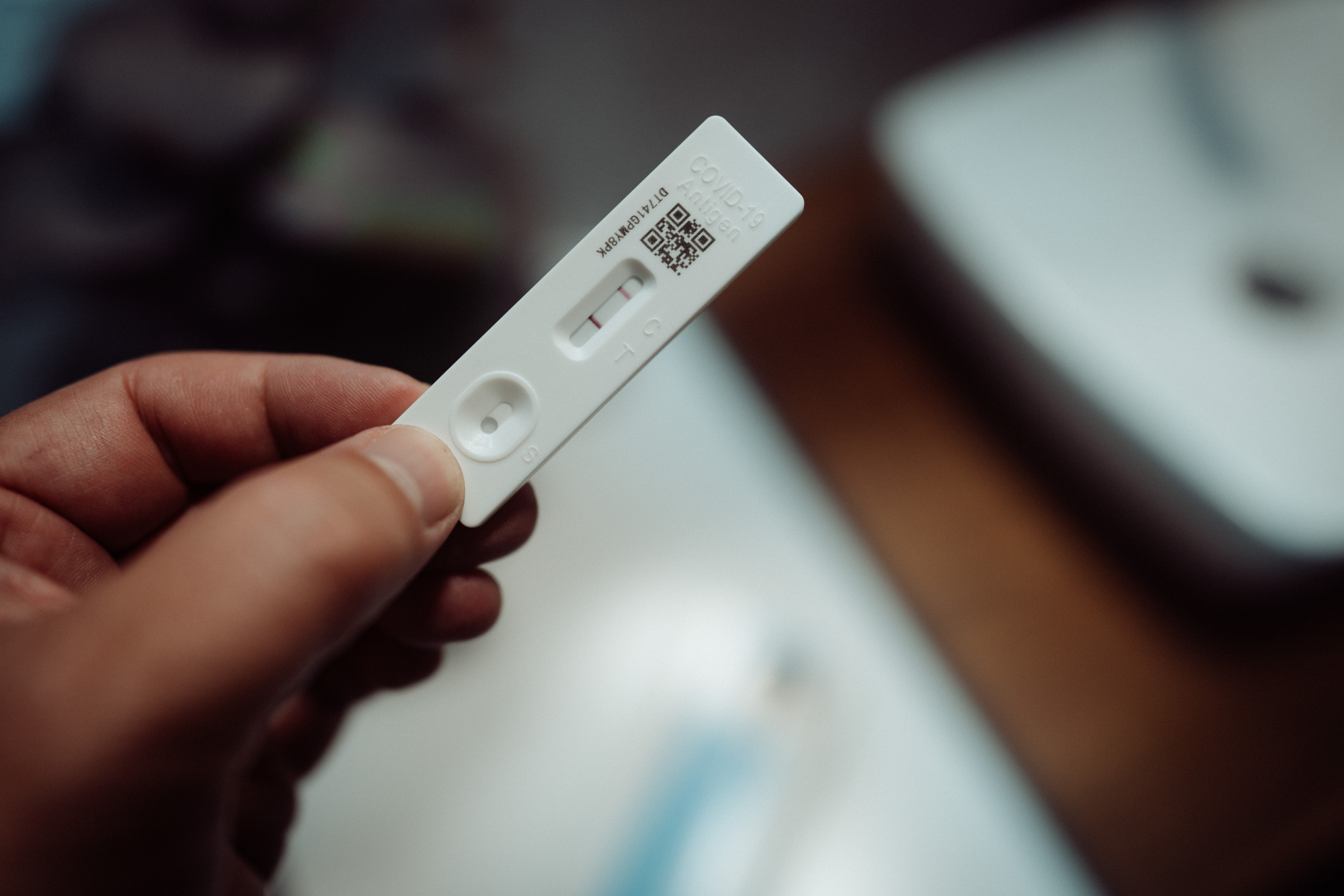 A COVID rapid test with two tell-tale lines. 
