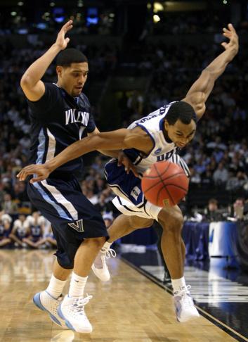 Gerald Henderson #15 of the Duke Blue Devils and Scottie Reynolds #1 of the Villanova Wildcats.