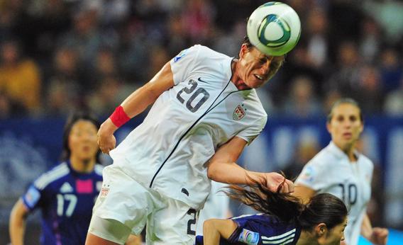 Abby Wambach heads the ball during the FIFA Women's Football World Cup final match Japan vs USA on July 17, 2011 in Frankfurt am Main, western Germany.