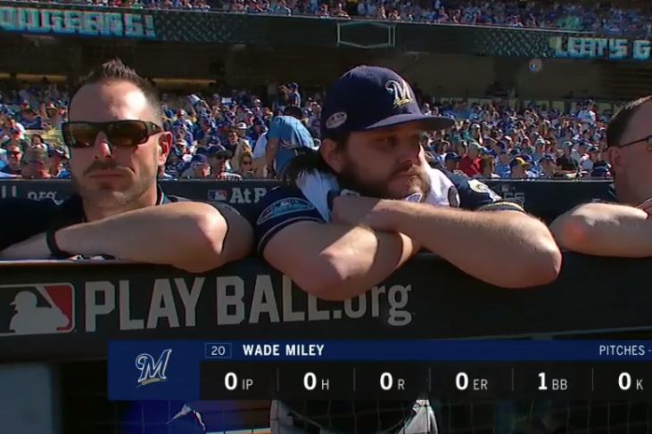 Wade Miley on the steps of the Brewers' dugout after he was removed from Wednesday's game.