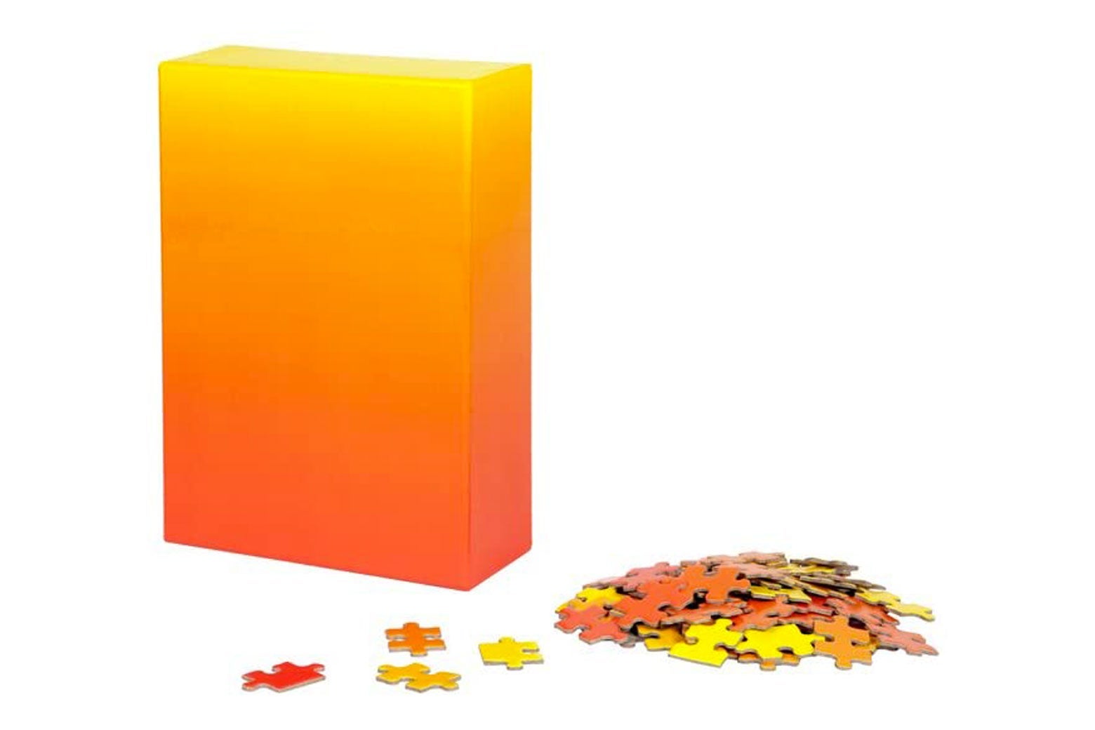 Puzzle box and a pile of puzzle pieces