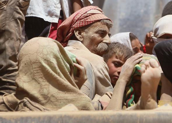 Photos From The ISIS Persecution Of Yazidis In Iraq.