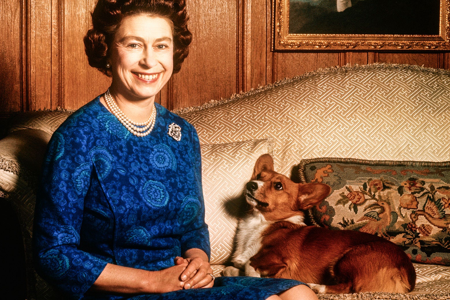 Queen Elizabeth with a corgi dog.