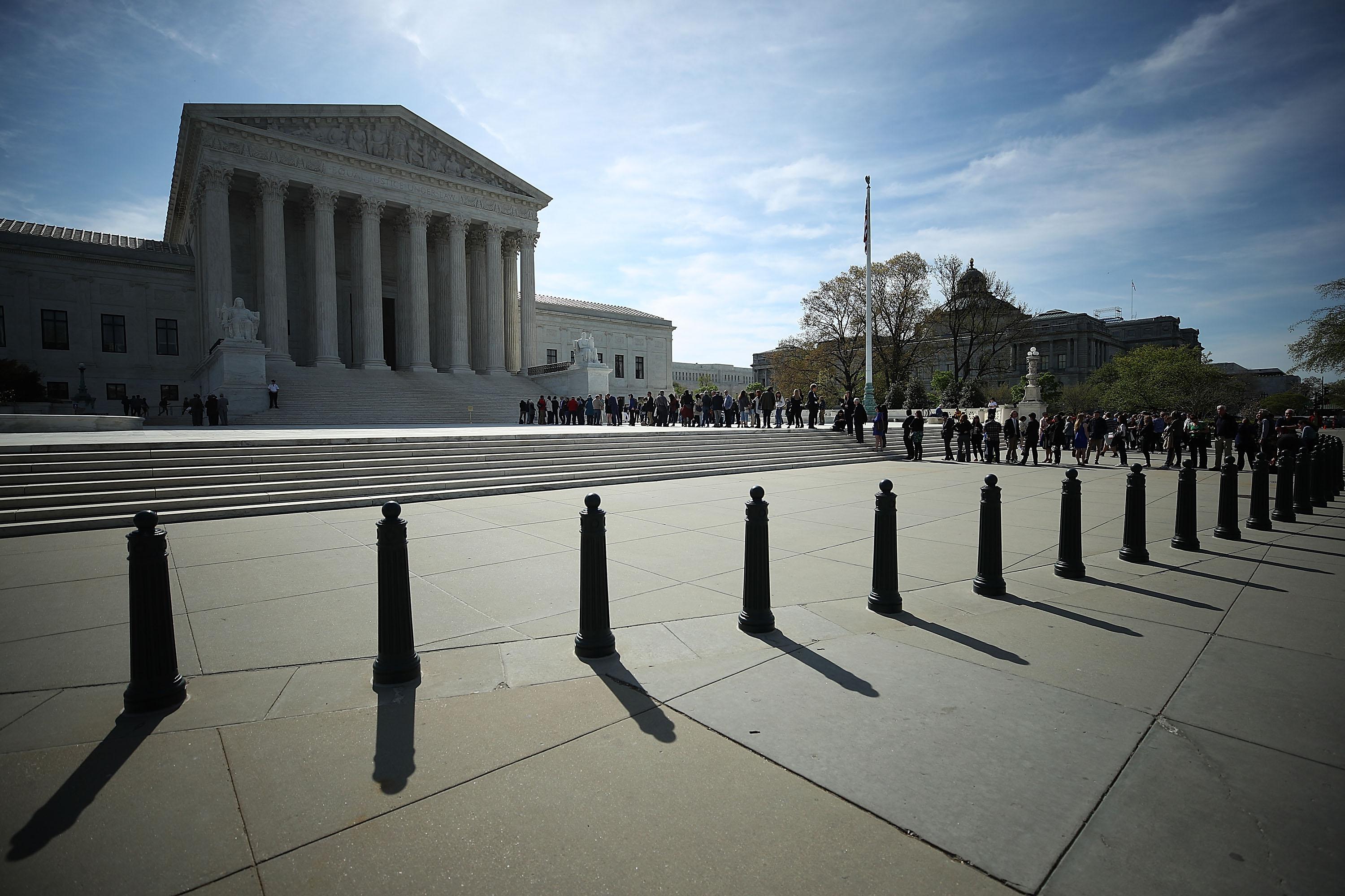 WASHINGTON, DC - APRIL 23: People wait in line to enter the U.S. Supreme Court, on April 23, 2018 in Washington, DC. Today the high court is hearing arguments in Chavez-Mesa v. US, which concerns a technical matter regarding sentencing guidelines. Deputy Attorney General Rod Rosenstein will be representing the government. (Photo by Mark Wilson/Getty Images)