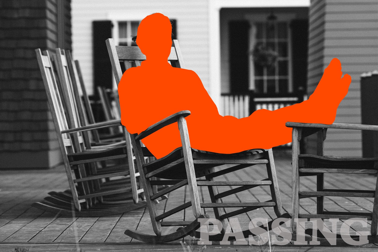 A man sitting on a rocking chair on a porch.