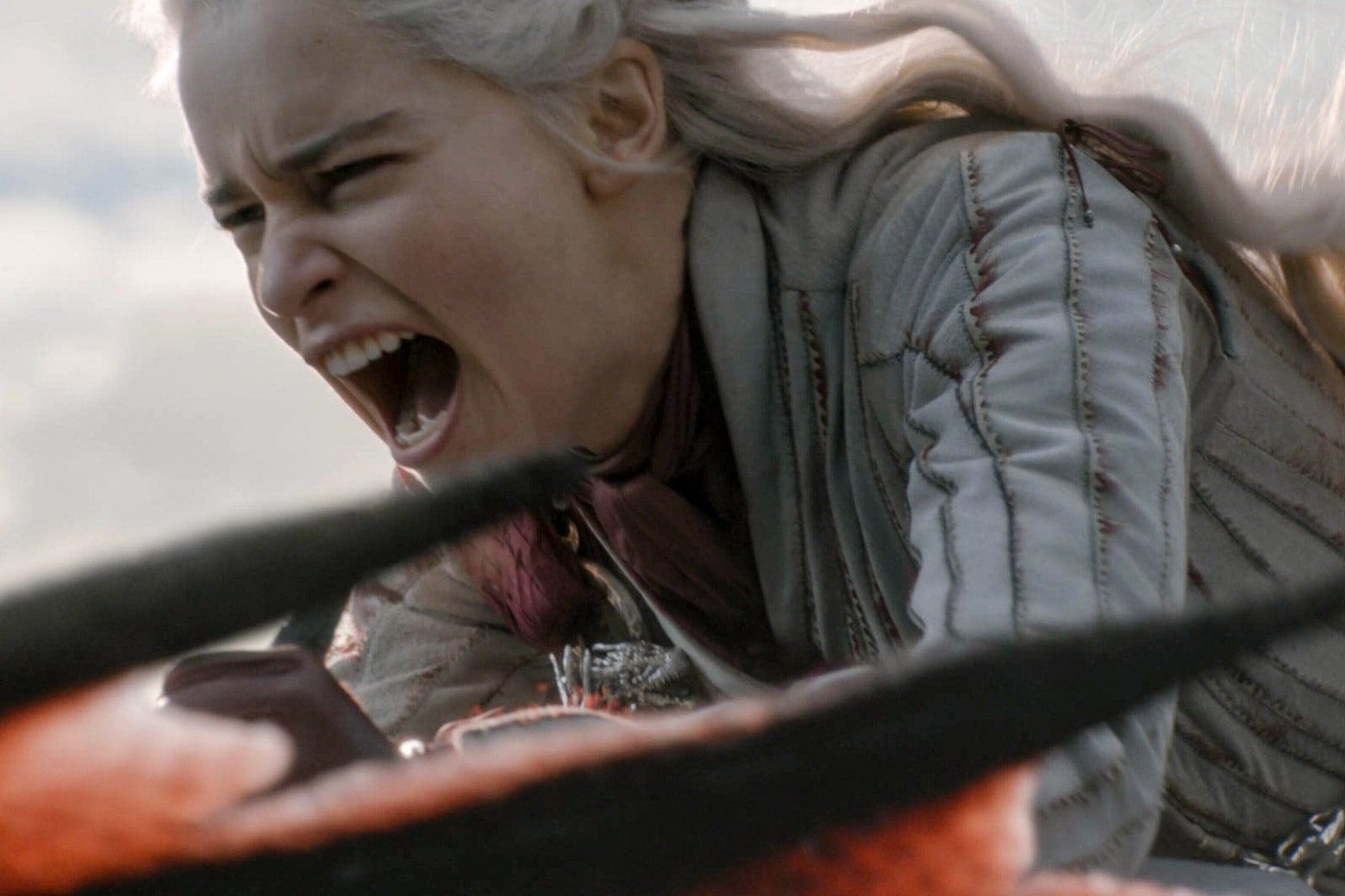Daenerys Targaryen mid-scream as she rides a dragon.