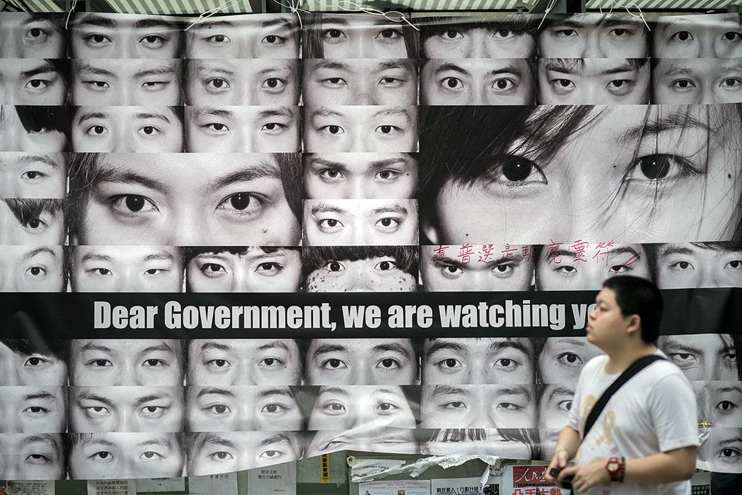Hong Kong posters showing pictures of the eyes of pro-democracy protesters 