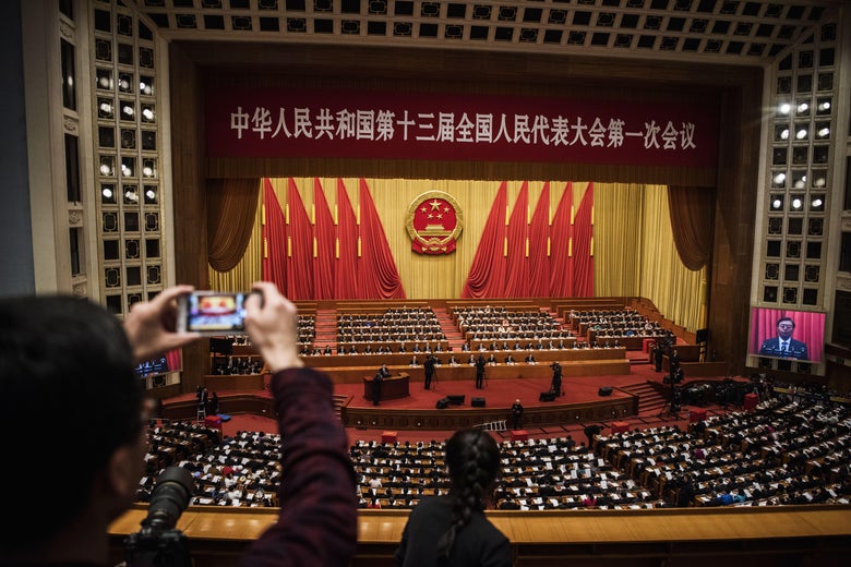 China's President Xi Jinping, (bottom C), joins a session of the National People's Congress to vote on a constitutional amendment at The Great Hall Of The People on March 11, 2018 in Beijing, China.