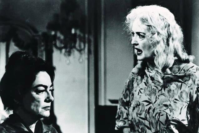 Joan Crawford and Bette Davis in an argument.