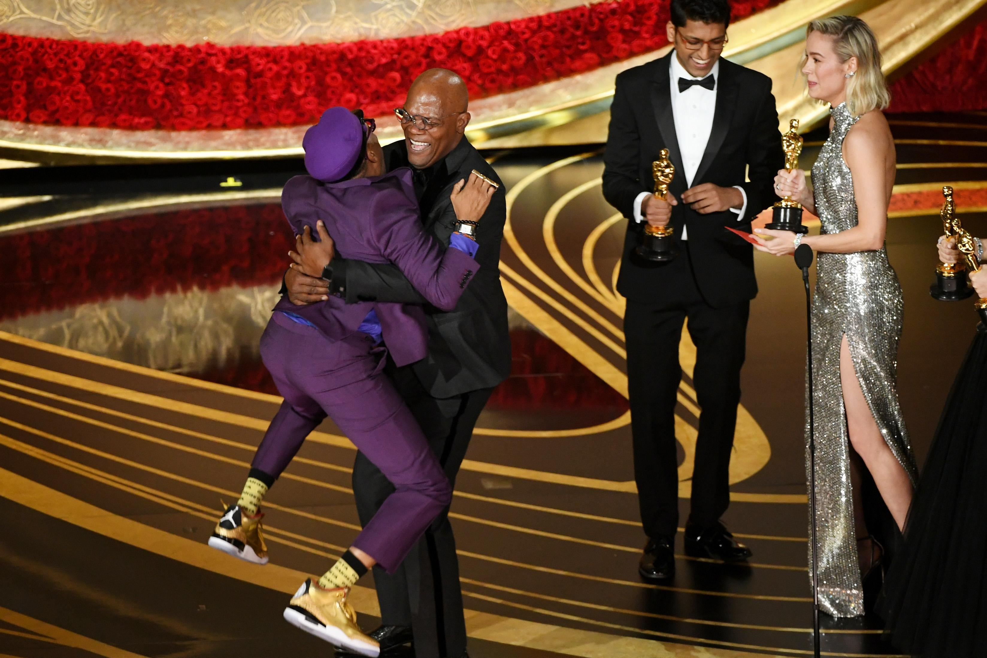 HOLLYWOOD, CALIFORNIA - FEBRUARY 24: Spike Lee accepts the Best Adapted Screenplay award for 'BlacKkKlansman' from Samuel L. Jackson onstage during the 91st Annual Academy Awards at Dolby Theatre on February 24, 2019 in Hollywood, California. (Photo by Kevin Winter/Getty Images)