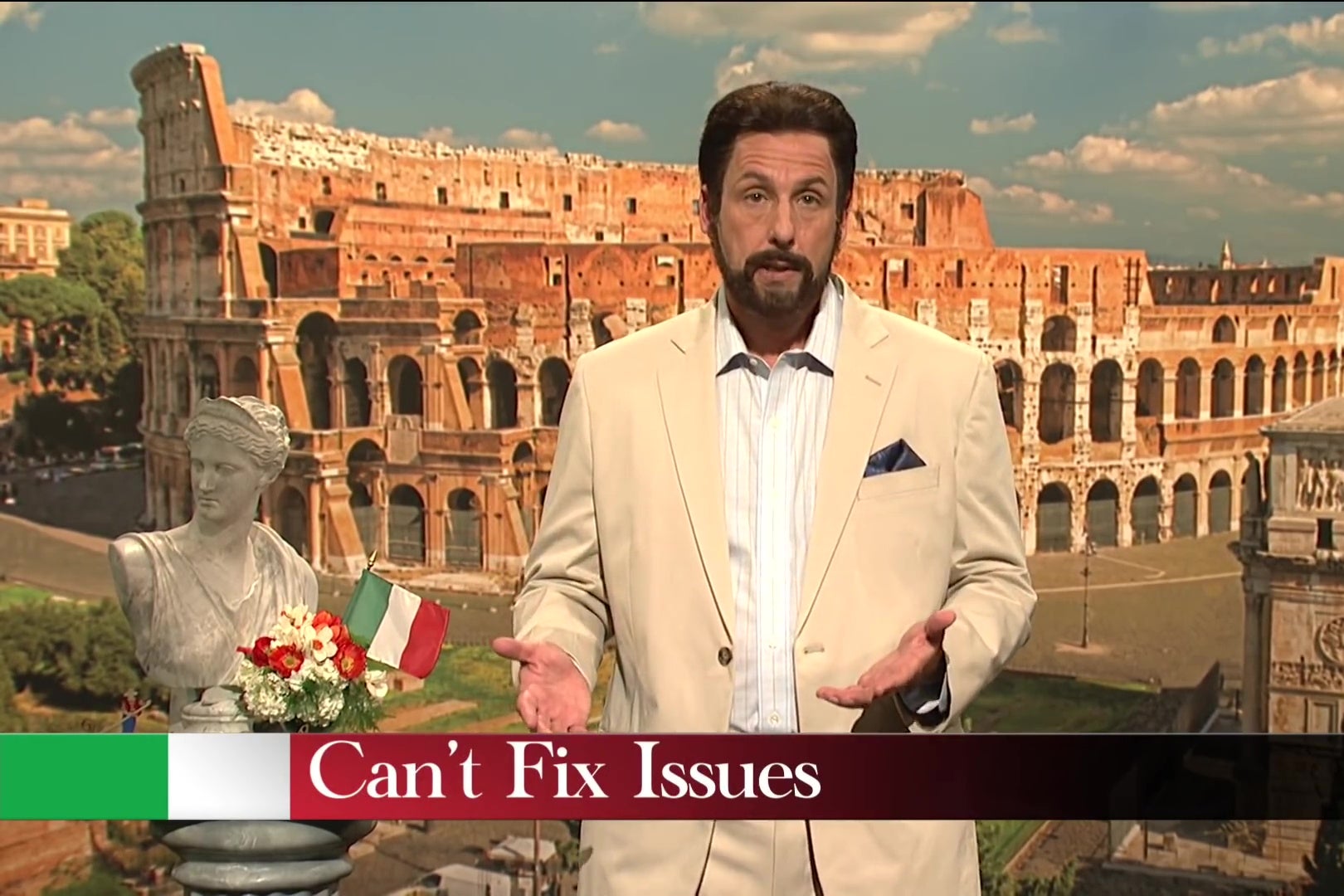 Adam Sandler stands in front of a photo of the Coliseum, above a chyron reading, "Can't Fix Issues."