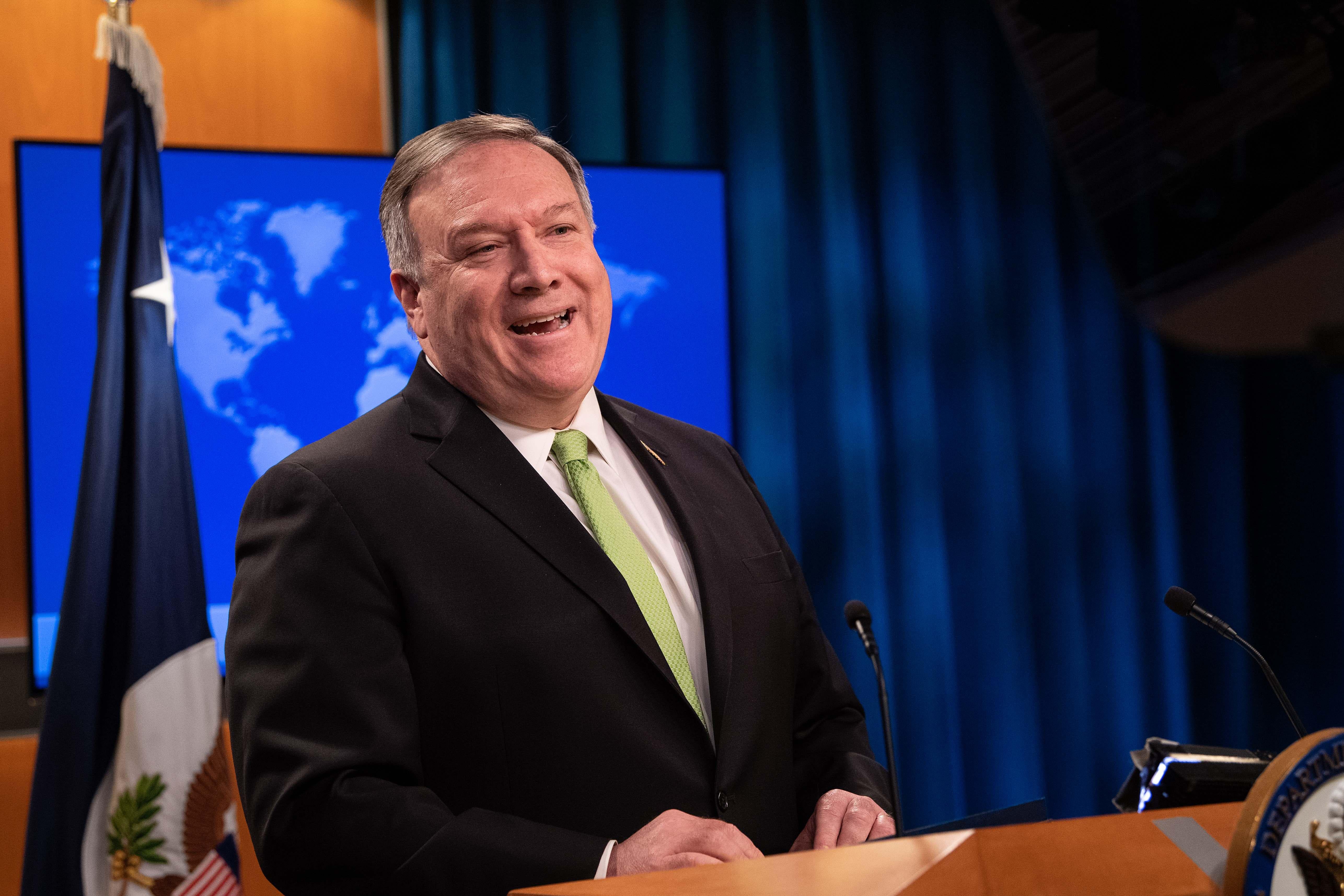 Pompeo speaks at a lectern