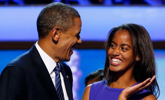 U.S. President Barack Obama jokes with his daughter Malia at DNC 2012.