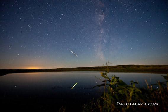 Meteor reflected in a lake.