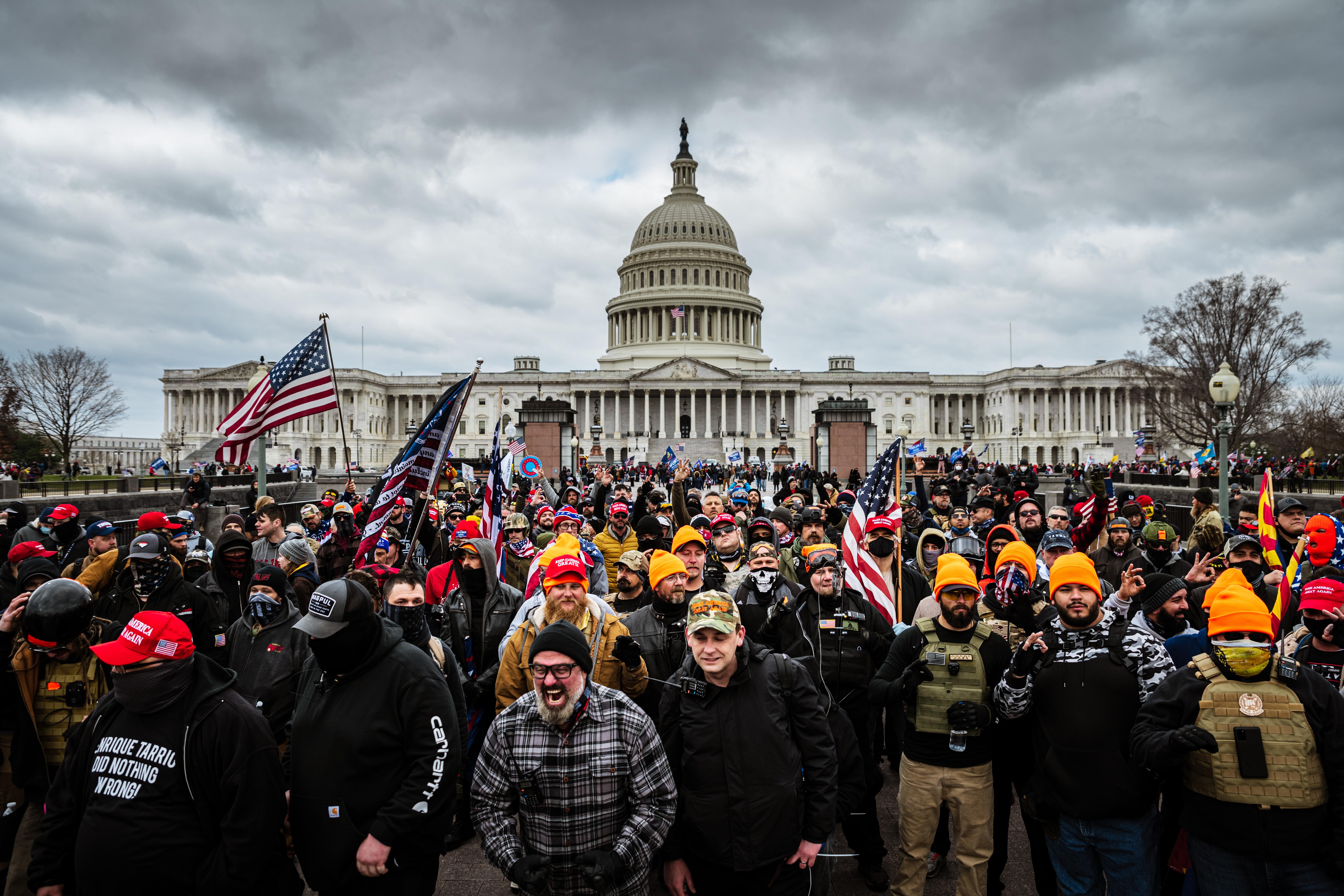 A mob is seen in front of the Capitol.