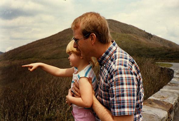 The author and her dad in the countryside.