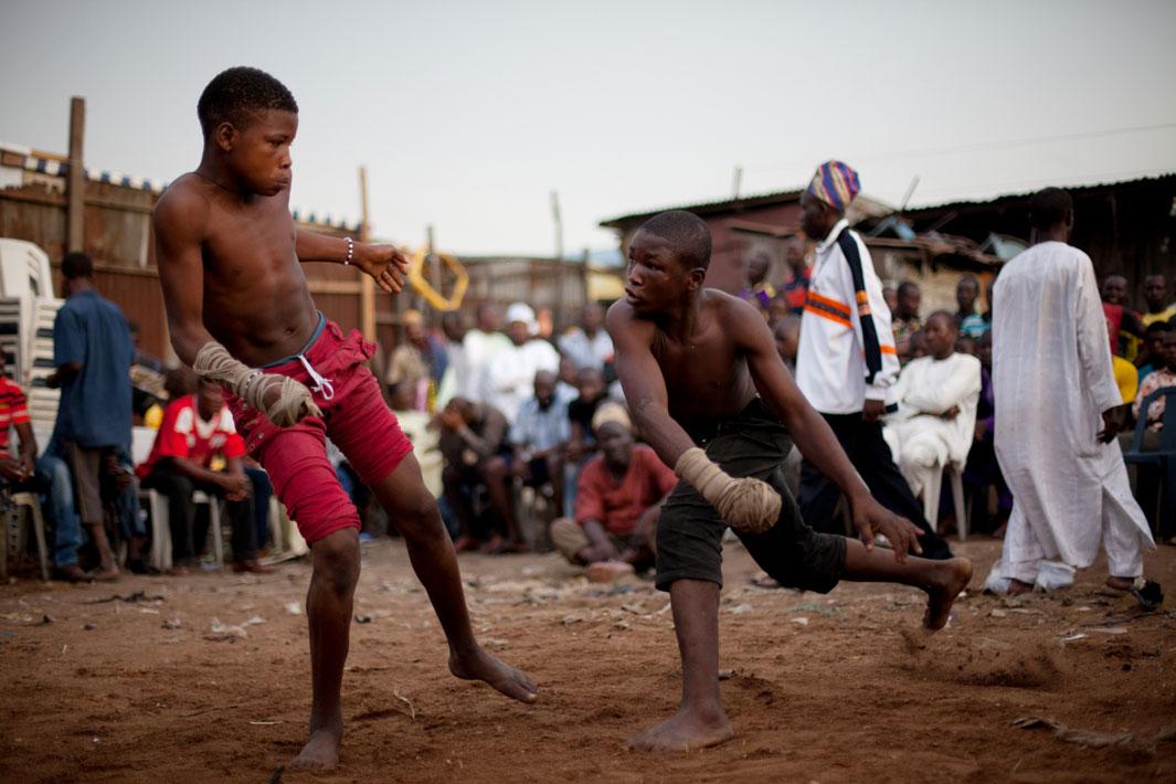 Lagos, Nigeria- Young Dambe boxers during a match in Lagos, Nigeria.