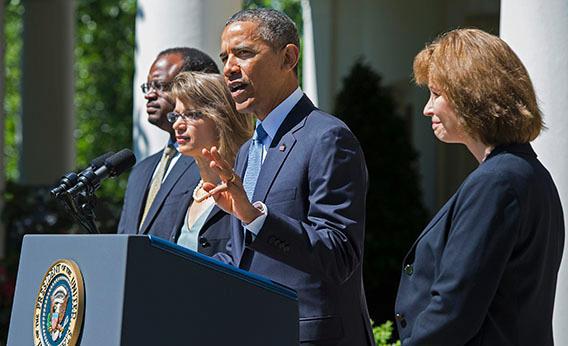 US President Barack Obama (C) gestures as he nominates Cornelia T. L. Pillard (R), a law professor; Patricia Ann Millett (2nd L), an appellate lawyer; and Robert L. Wilkins (L), a federal district judge, to fill the remaining vacancies on the United States Court of Appeals for the District of Columbia Circuit during an event in the Rose Garden at the White House in Washington, DC, June 4, 2013.