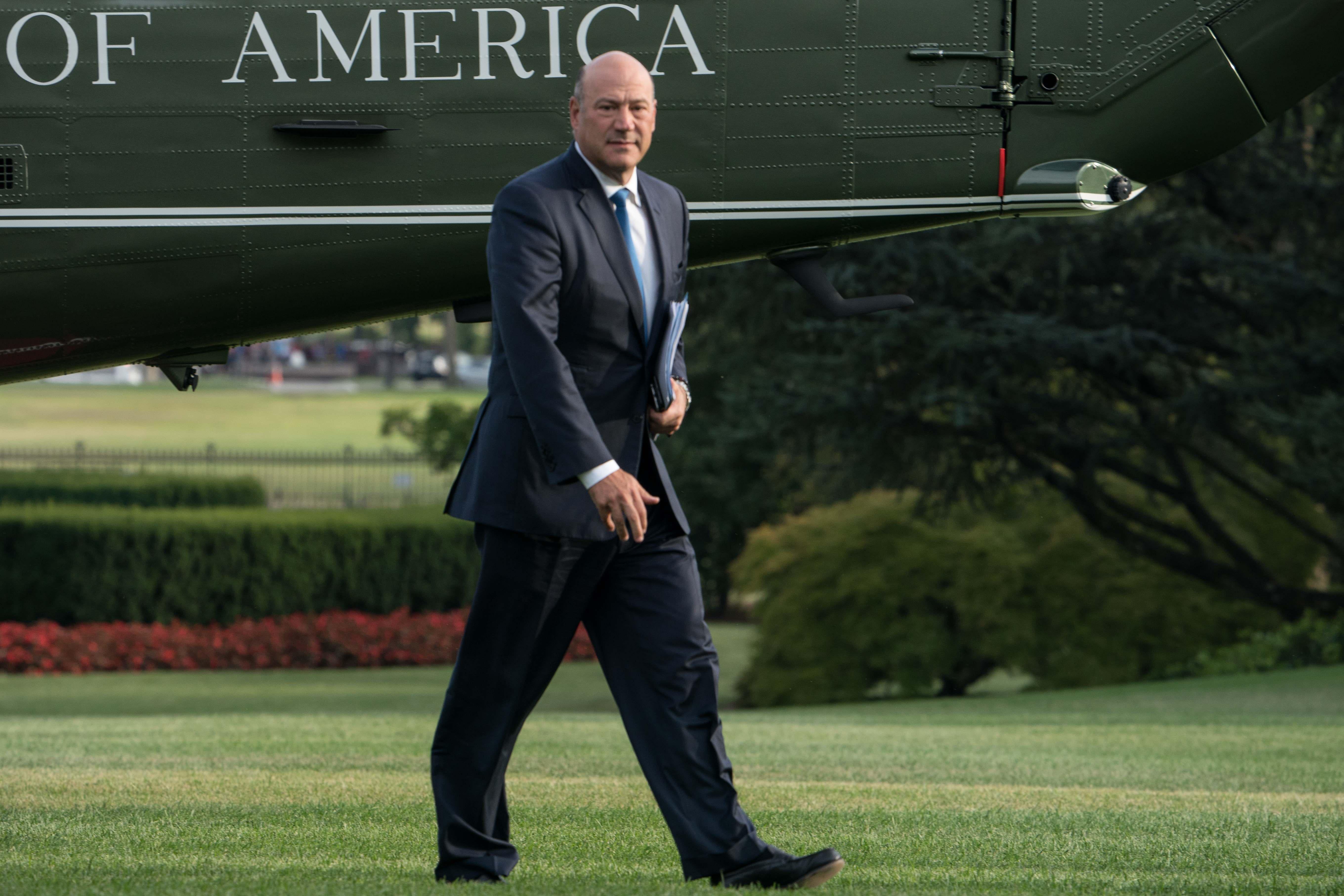 White House economic adviser Gary Cohn walks to the White House in Washington, DC, on August 30, 2017 upon return from Springfield, Missouri, where President Donald Trump spoke about tax reform.