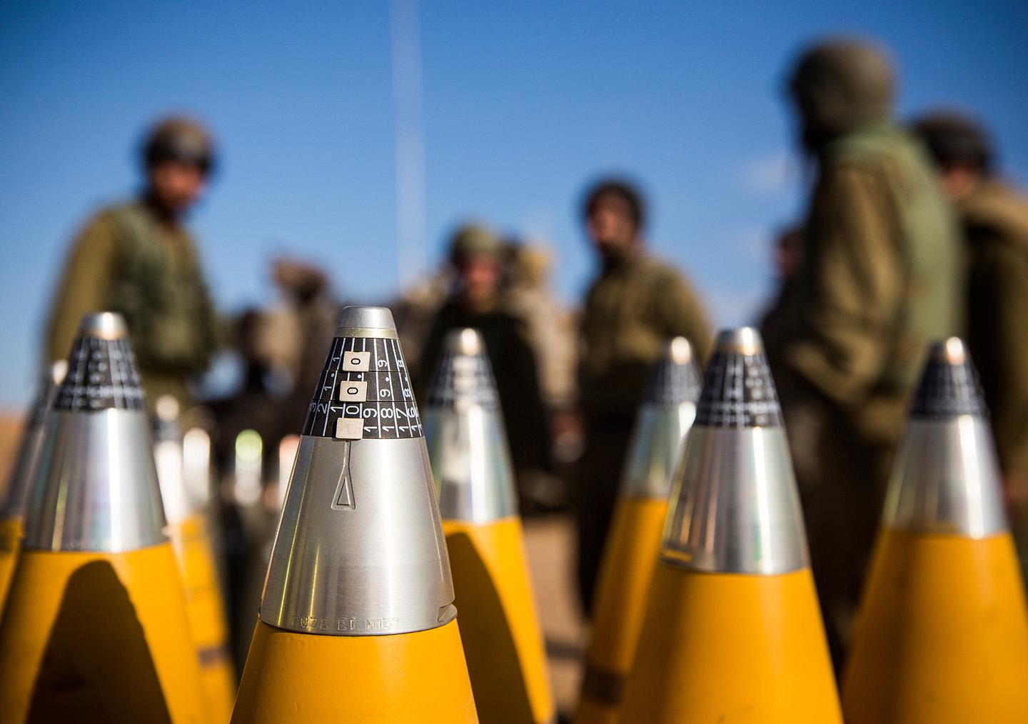 Israeli artillery shells sit waiting to be fired into Gaza.