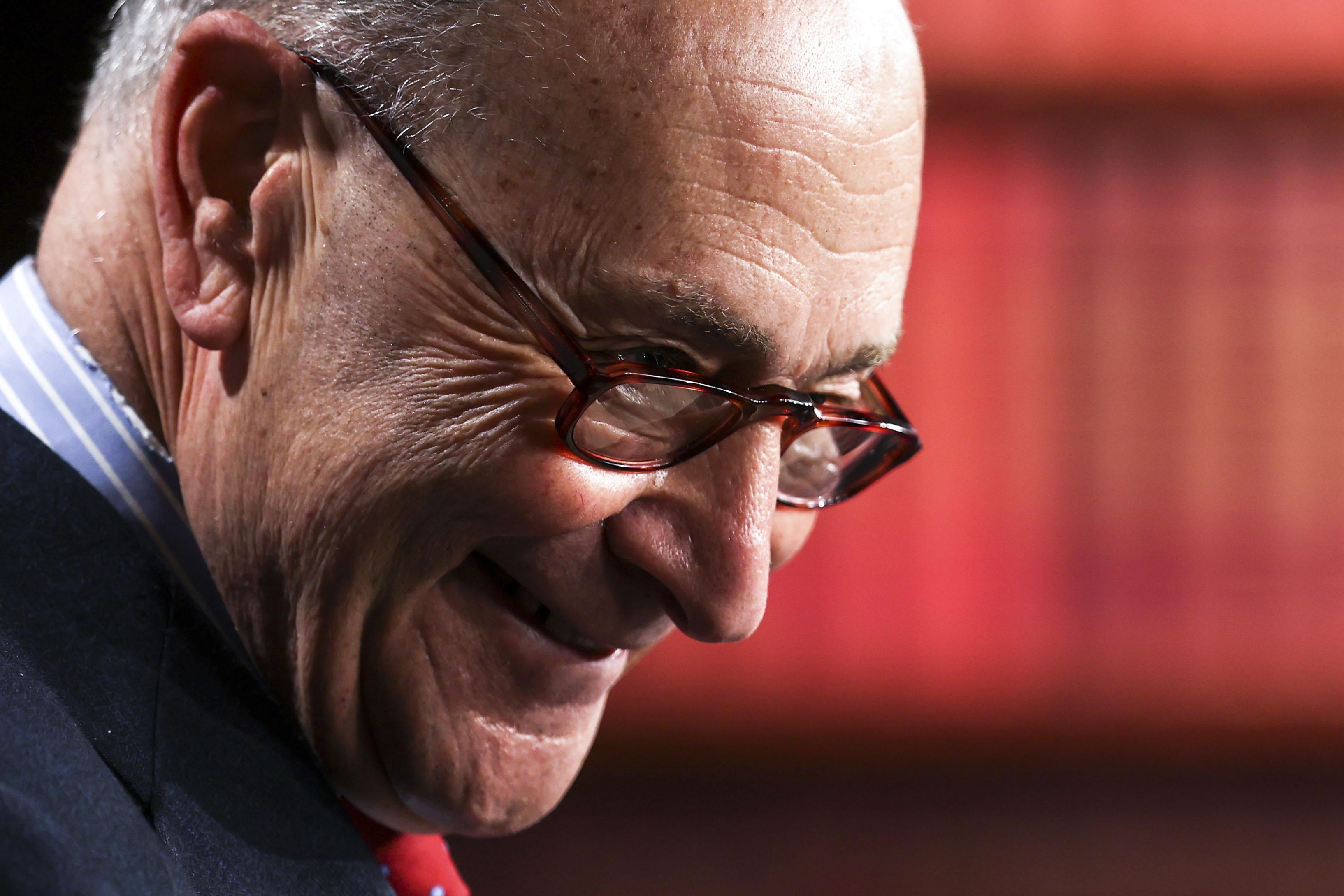 Close-up of Schumer grinning deviously