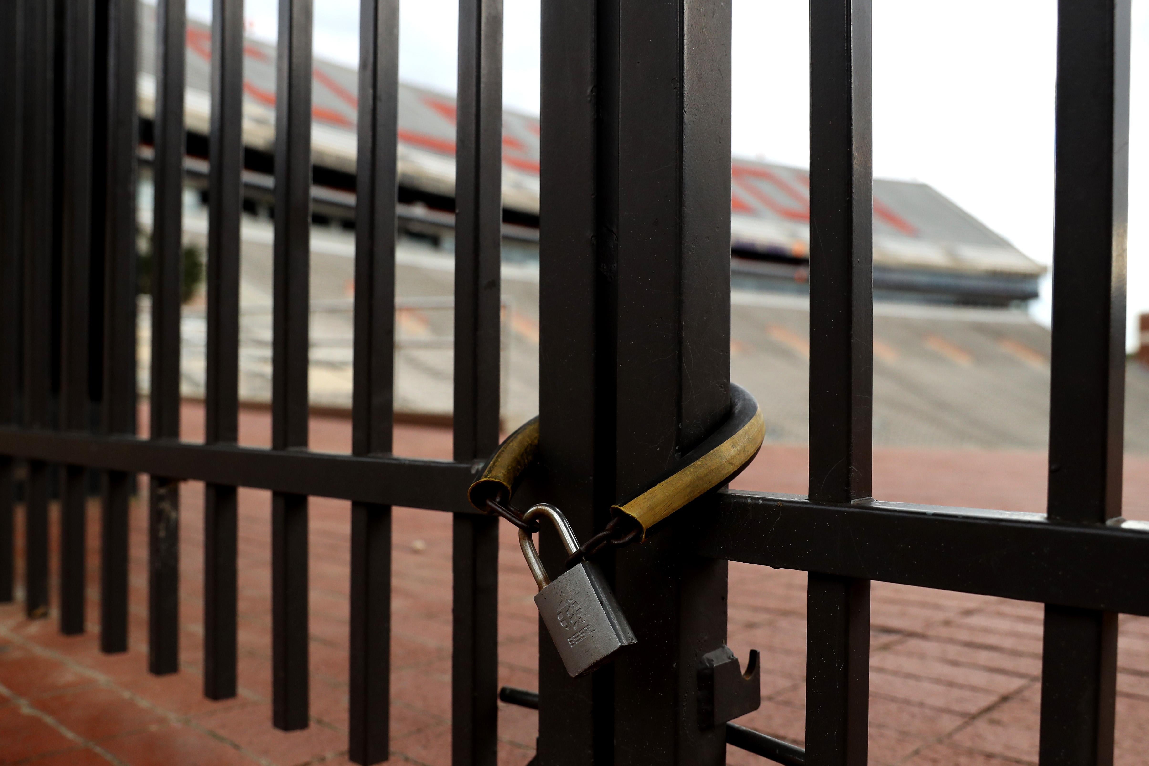 A locked gate at Clemson Memorial Stadium on June 10
