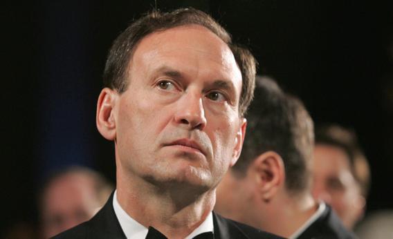 US Supreme Court Justice Samuel Alito listens as US President George W. Bush speaks at the the Federalist Society's 25th Anniversary Gala Dinner at Union Station in Washington, DC 15 November 2007.