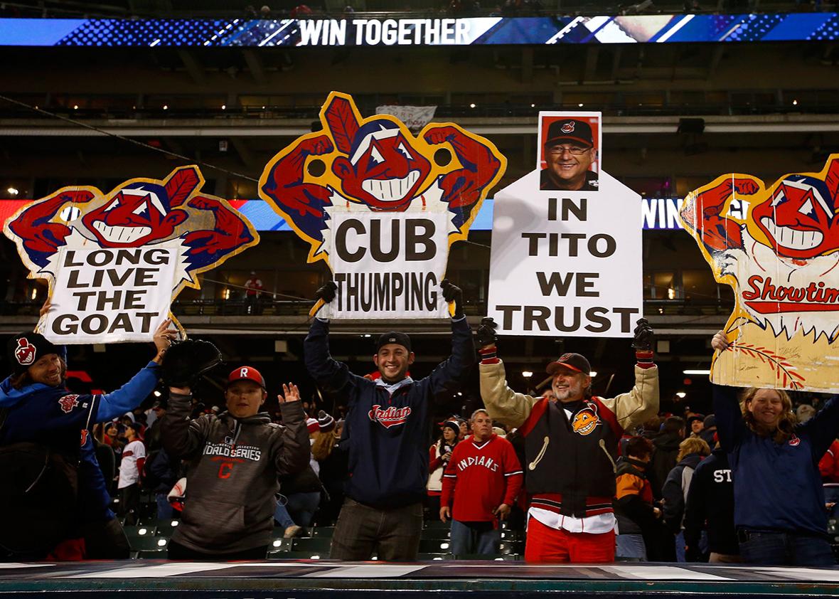 Cleveland Indians fans hold signs after the Cleveland Indians defeated the Chicago Cubs 6-0 in Game One of the 2016 World Series at Progressive Field on October 25, 2016 in Cleveland, Ohio. 
