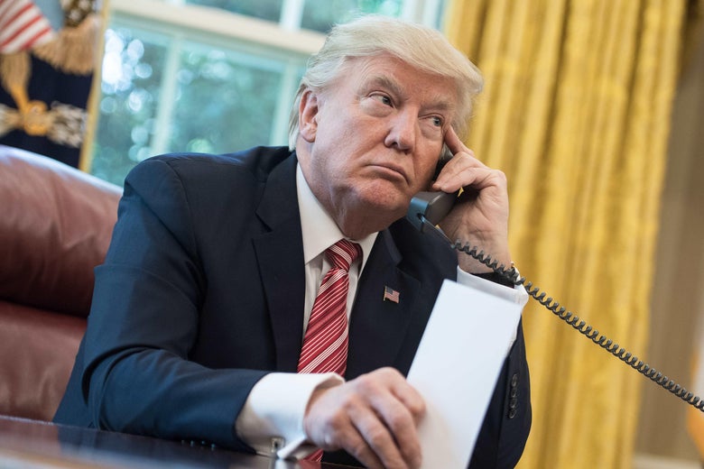 President Trump on the phone in the Oval Office at the White House in Washington, DC, on June 27, 2017.