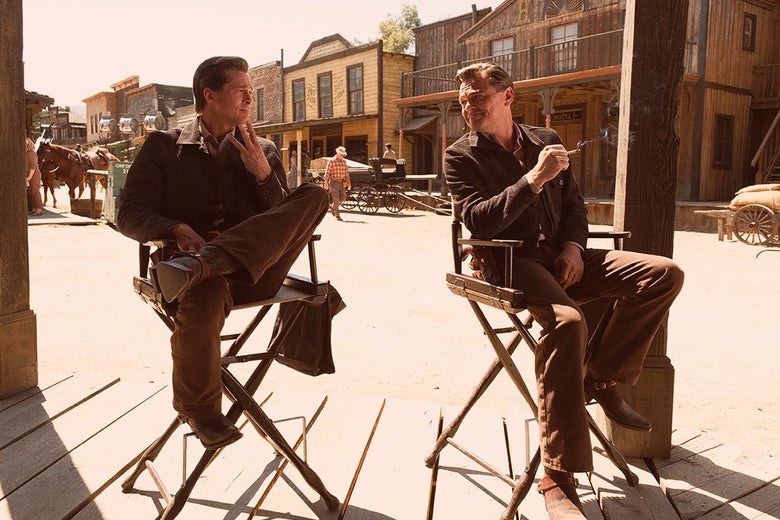 Brad Pitt and Leonardo DiCaprio’s characters sit in director's chairs on set in the film.