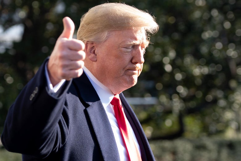 President Donald Trump gives a thumbs-up as he speaks to the press at the South Lawn of the White House in Washington, D.C. on December 7, 2018. 