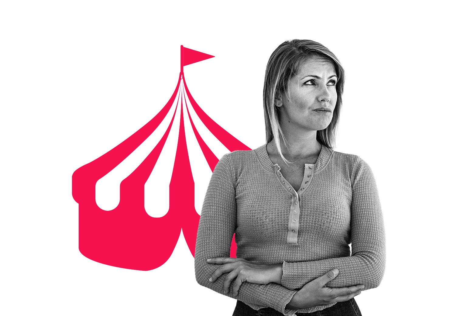 A woman looks annoyed next to a circus tent.