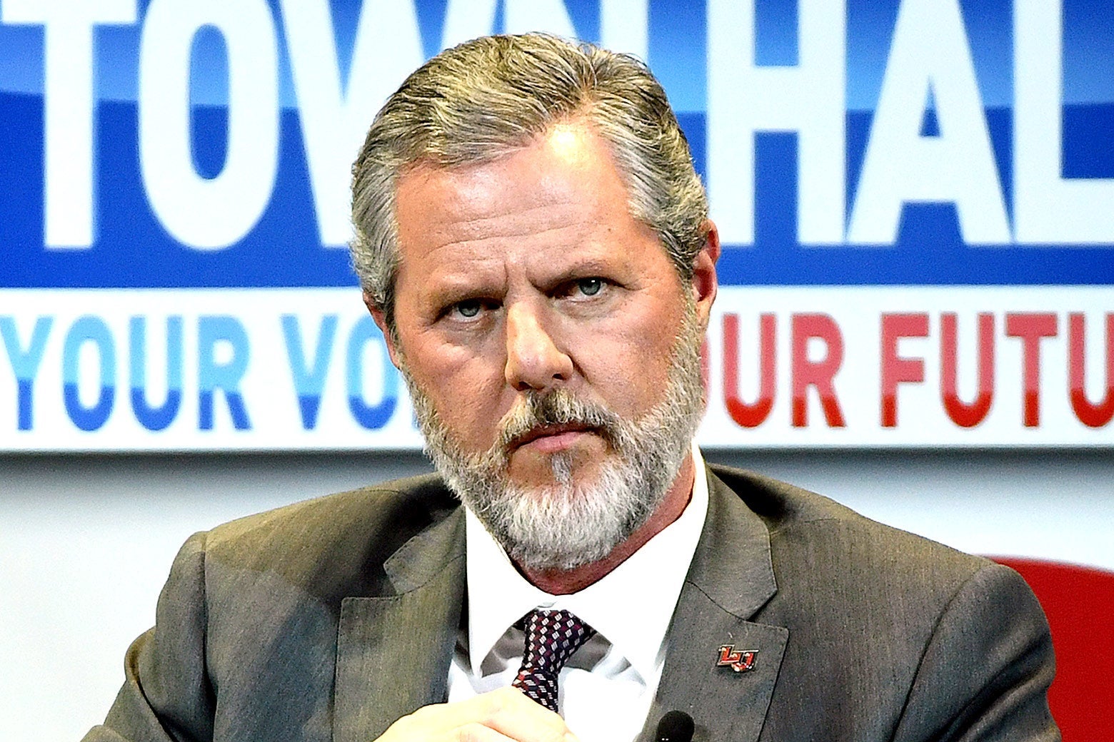 Jerry Falwell Jr. furrows his brow while onstage at an event.