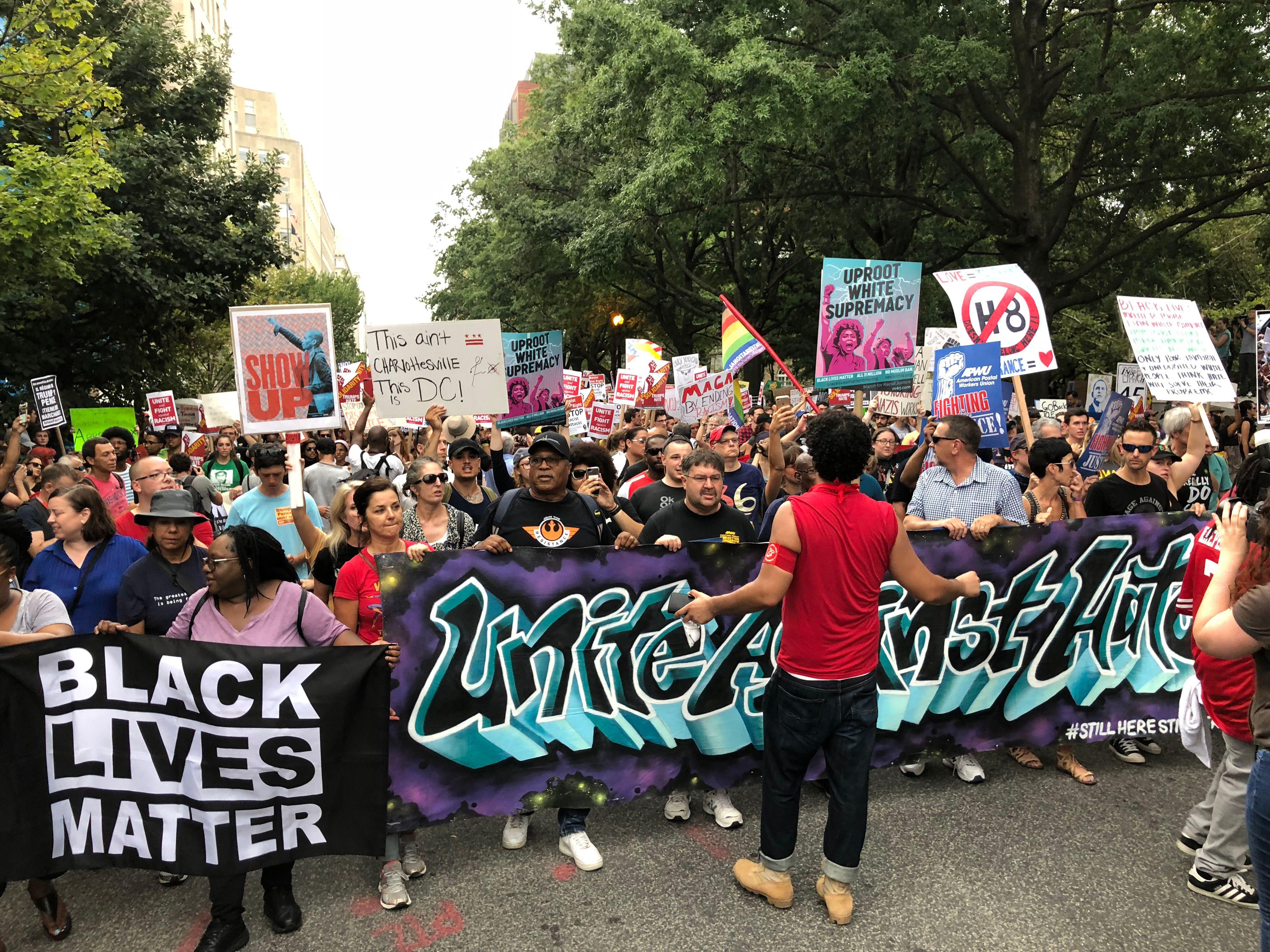 Protesters march against the far-right's Unite the Right rally August 12, 2018 in Washington, D.C.