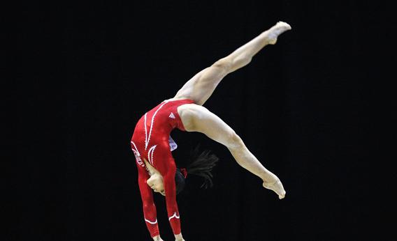Ivana Hong of the U.S. performs her routine on the beam during the qualifying round of the Gymnastics World Championships at the O2 Arena in London October 14, 2009.