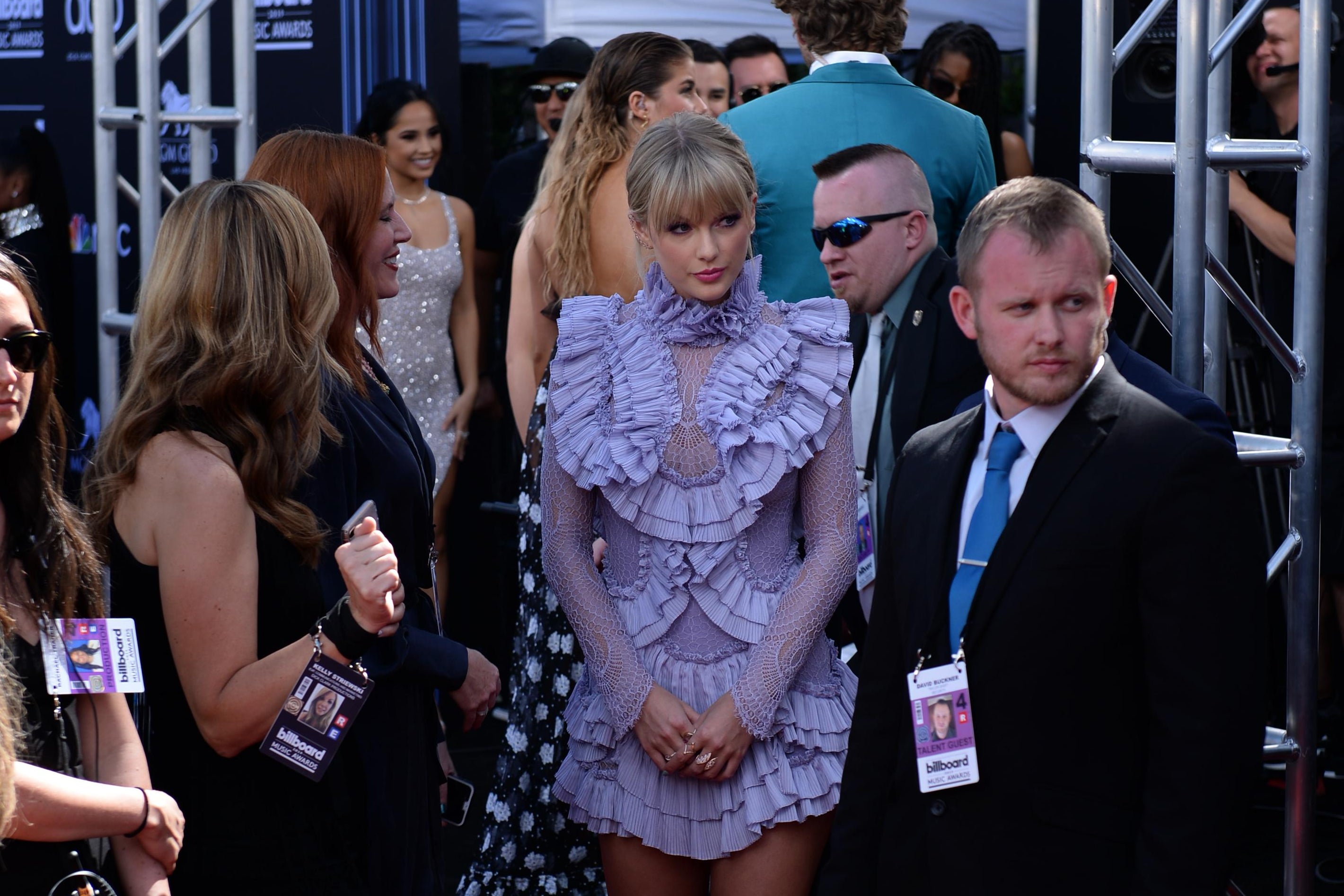 US singer Taylor Swift (C) waits to walk the red carpet as she arrives for the 2019 Billboard Music Awards at the MGM Grand Garden Arena on May 1, 2019, in Las Vegas, Nevada. (Photo by Bridget BENNETT / AFP)        (Photo credit should read BRIDGET BENNETT/AFP/Getty Images)