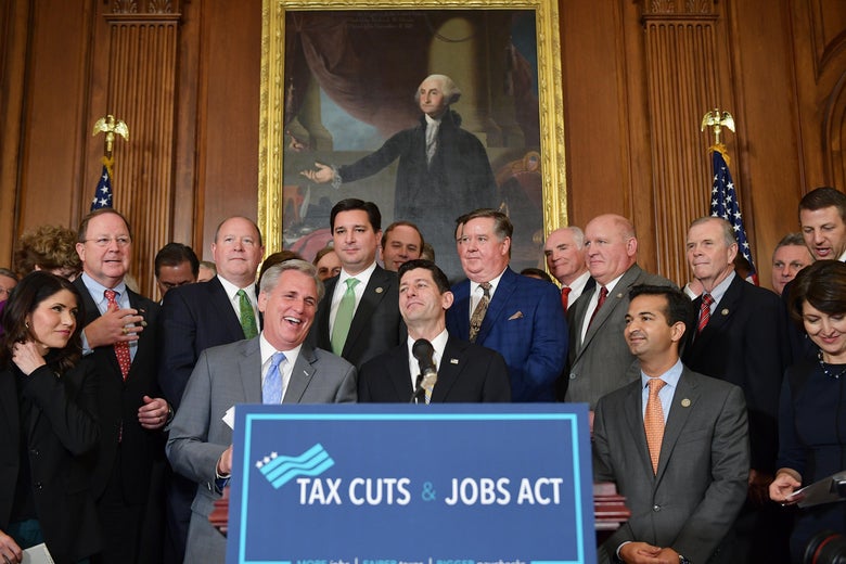 House Majority Leader Kevin, R-CA, laughs with House Speaker Paul Ryan, R-WI, during a press conference after the House passed its version of the Republican tax overhaul in the Rayburn Room of the US Capitol on November 16, 2017 in Washington, DC. / AFP PHOTO / MANDEL NGAN (Photo credit should read MANDEL NGAN/AFP/Getty Images)