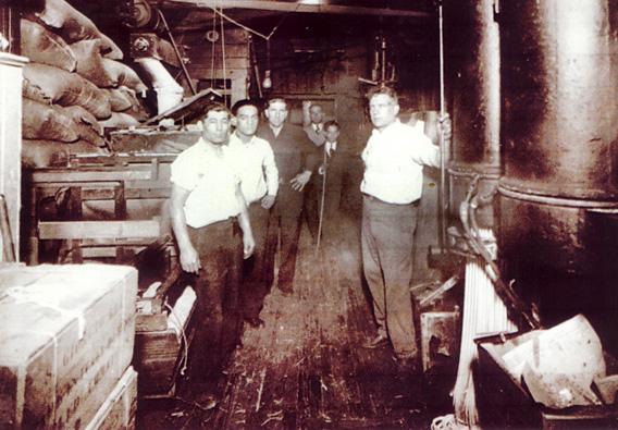 Giorgio Cataudella, right, and some of his employees at the Harlem Macaroni Co. factory around early 1930s.