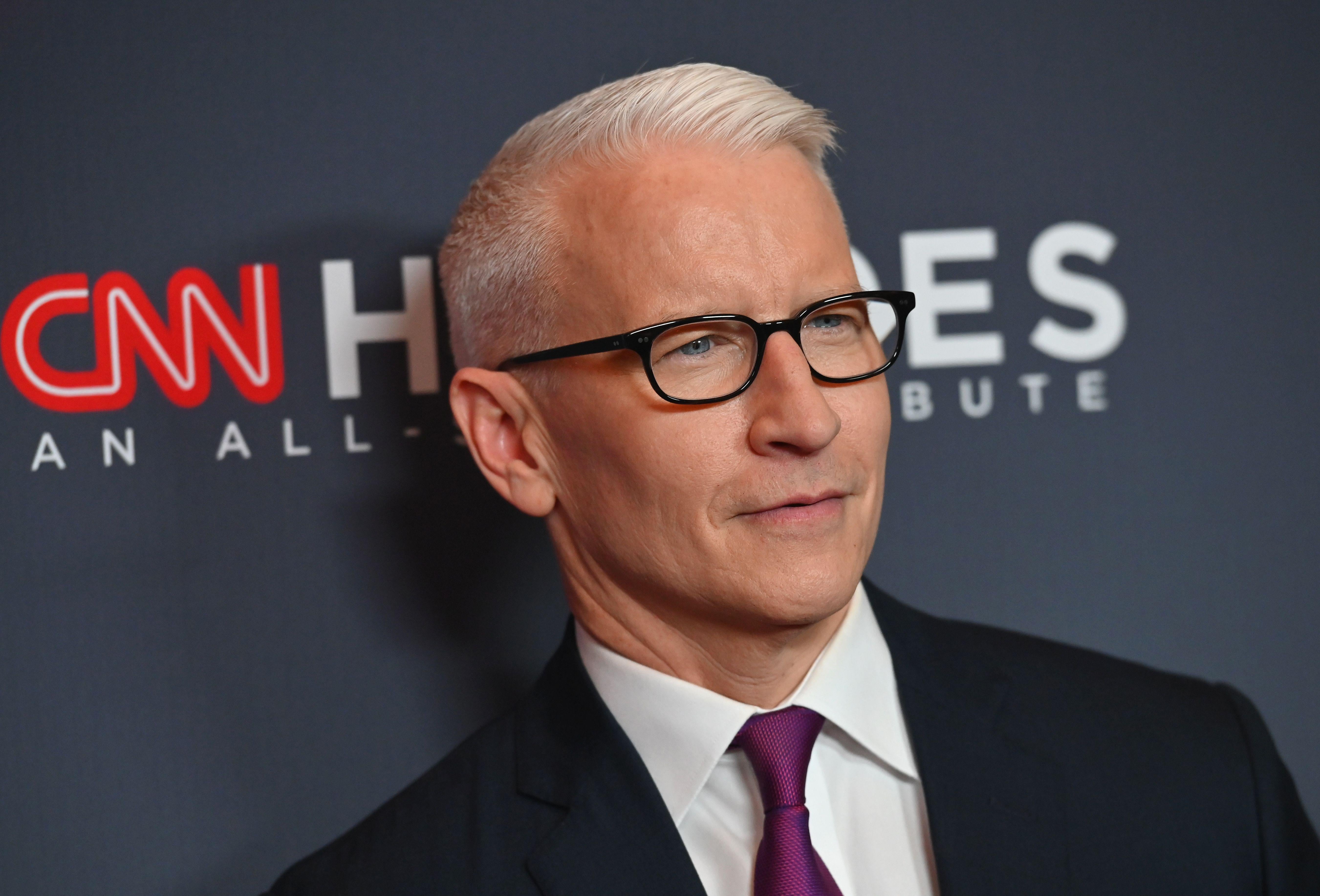 Ex-QAnon Believer to Anderson Cooper: &ldquo;I Apologize for Thinking That You Ate Babies&rdquo;