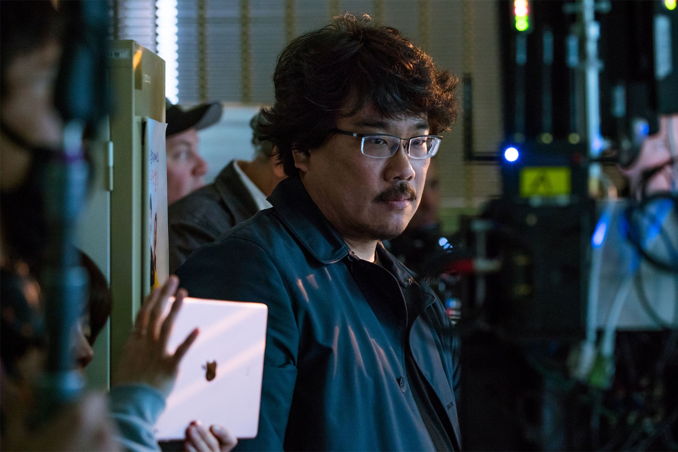Bong standing among crew members.