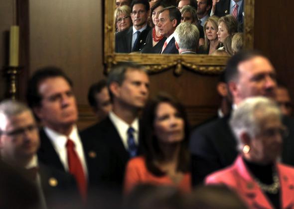 Speaker of the House Rep. John Boehner (R-OH) (C) speaks during a rally as other House Republicans look on after a vote September 20, 2013 on Capitol Hill in Washington, DC. 