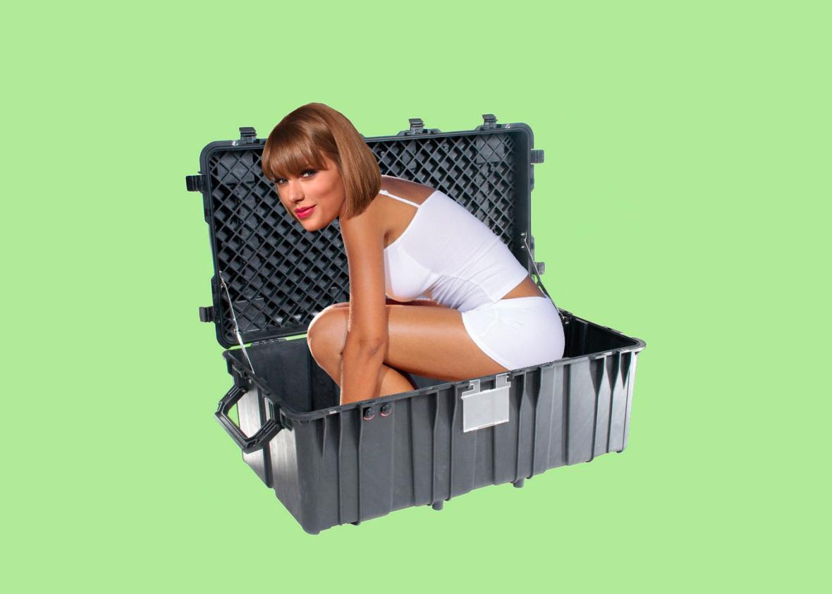 Taylor Swift Climbing Into A Box