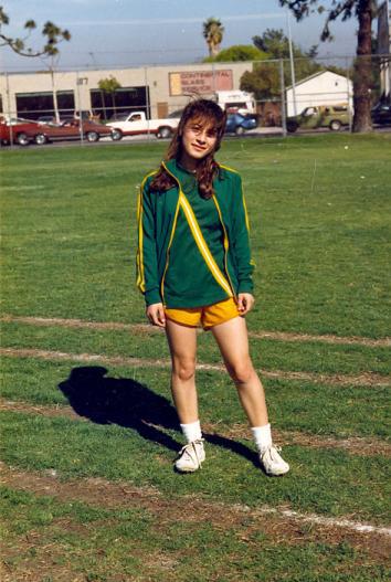 Esparza in running track uniform in junior high.