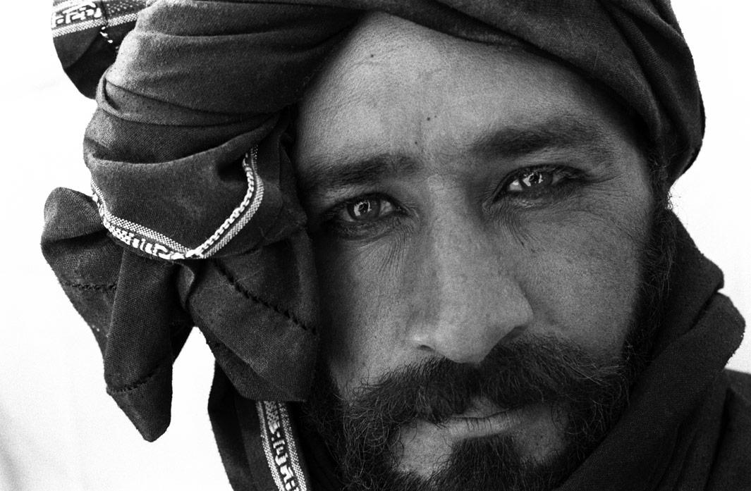Internally Displaced Persons from a nearby IDP camp outside Kandahar, Kandahar Province, Afghanistan on August 12. 2004