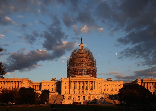 The afternoon sun hits the U.S. Capitol on the eve of the nation's midterm elections, Nov. 3, 2014, in Washington, D.C. 