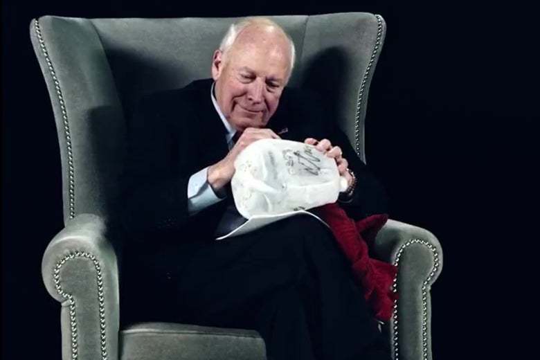 Dick Cheney signing a waterboarding kit.