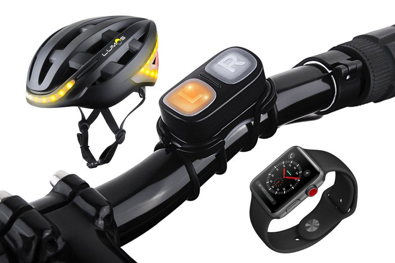 A Lumos helmet, bike handlebars, and an Apple Watch.