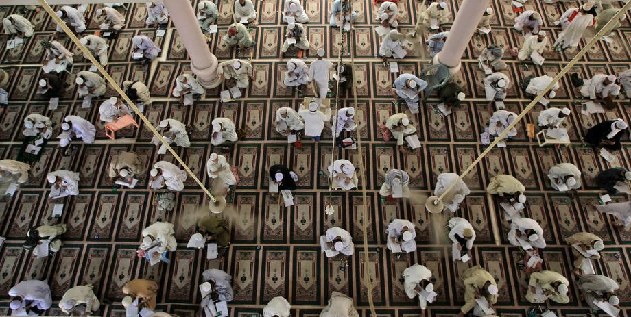 Pakistani religious students attend their examinations at the Jamia Binoria Islamic seminary in Karachi, Pakistan on Saturday, March 16, 2013.