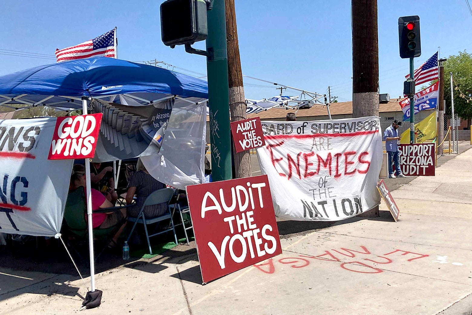 An encampment outsise of the Arizona ballot audit.