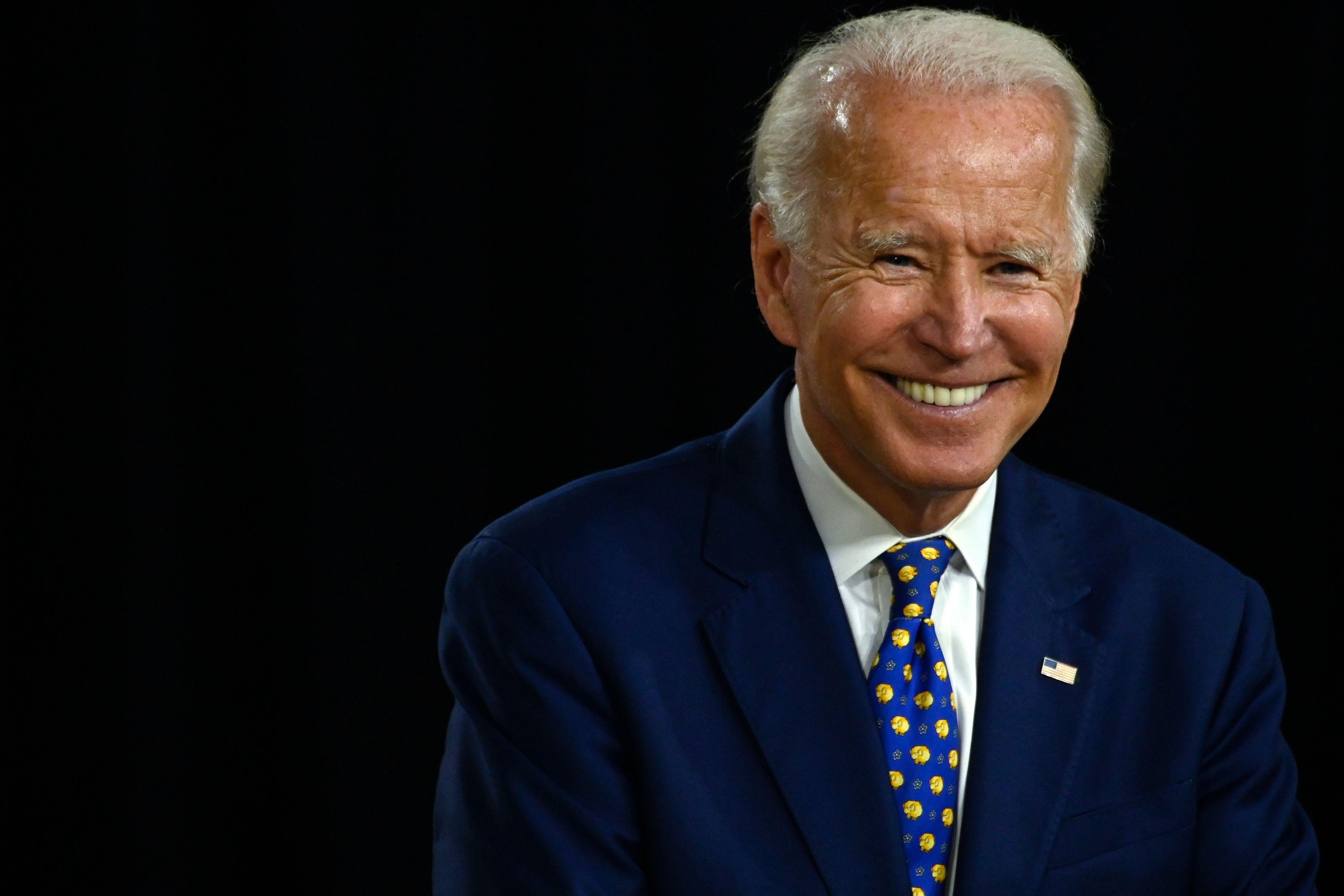 Former Vice President Joe Biden smiles as he speaks during a campaign event at the William “Hicks” Anderson Community Center in Wilmington, Delaware on July 28, 2020.